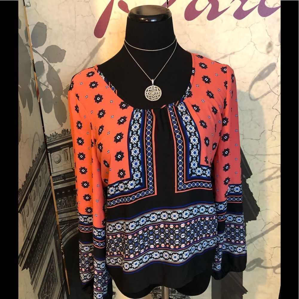 Beautiful blouse by Takara size medium